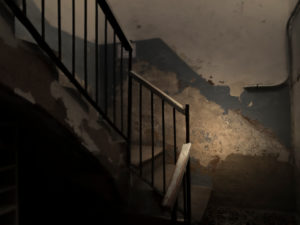 gloomy staircase in a semi-abandoned building gloomy staircase in a semi-abandoned building